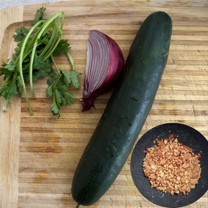 Cucumber Peanut Salad Ingredients on a cutting board