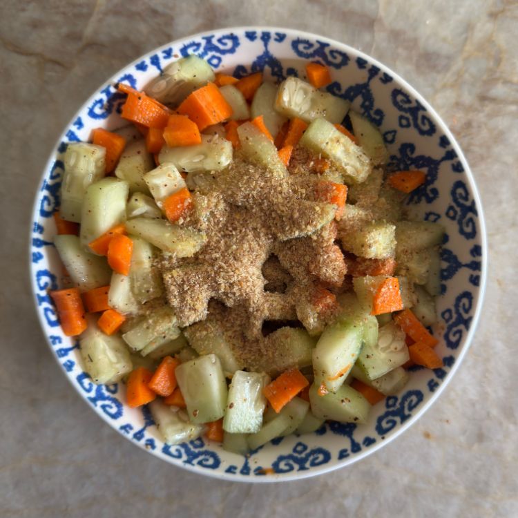 cucumber carrot salad with flax seeds in a bowl