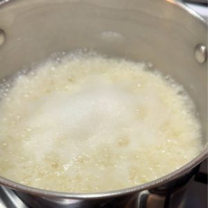 cooking white rice until water starts to come to the same level